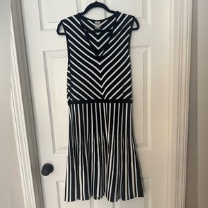 Sleeveless black and white sweater dress